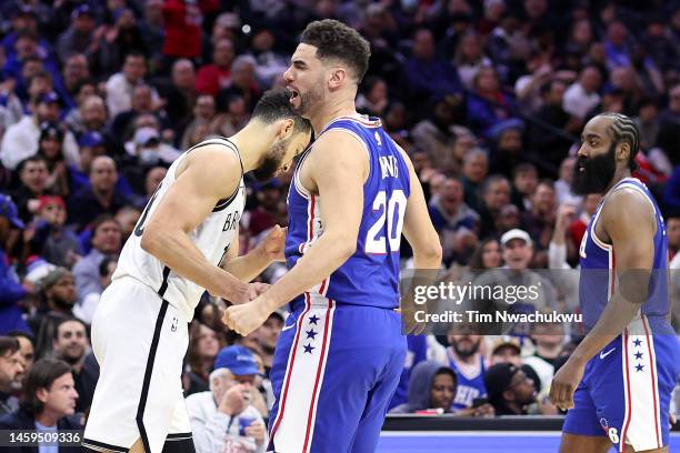 Georges Niang of the Philadelphia 76ers reacts by Ben Simmons of the Brooklyn Nets during the fourth quarter at Wells Fargo Center on January 25,...