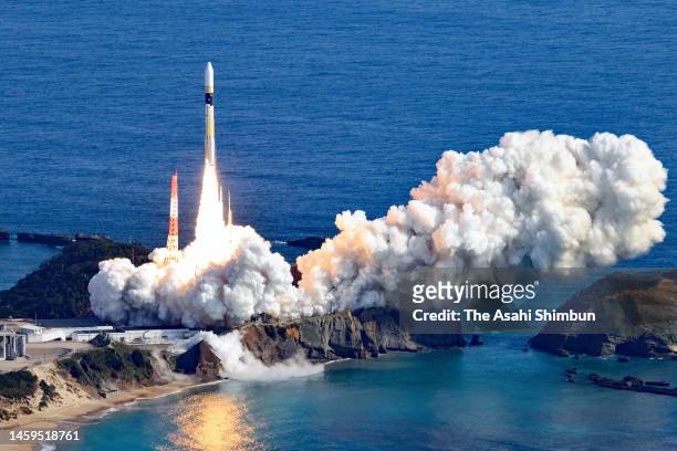 In this aerial image, the H2A No.46 rocket lifts off from Japan Aerospace Exploration Agency Tanegashima Space Center on January 26, 2023 in...