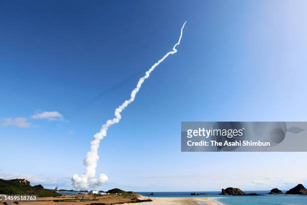 The H2A No.46 rocket leaves a contrail after the liftoff from Japan Aerospace Exploration Agency Tanegashima Space Center on January 26, 2023 in...