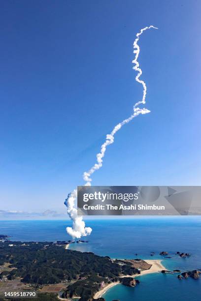 In this aerial image, the H2A No.46 rocket leaves a contrail after the liftoff from Japan Aerospace Exploration Agency Tanegashima Space Center on...