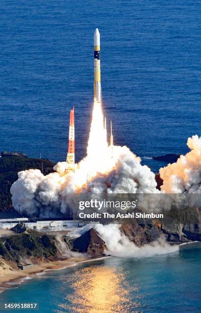 In this aerial image, the H2A No.46 rocket lifts off from Japan Aerospace Exploration Agency Tanegashima Space Center on January 26, 2023 in...