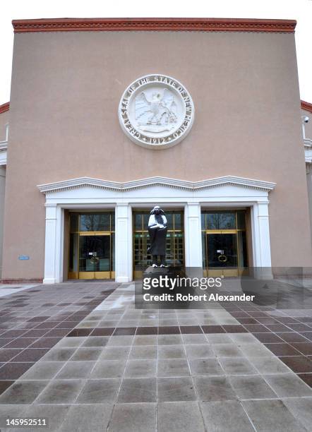 An entrance to the New Mexico State Capitol in Santa Fe, known as the Roundhouse, features a bronze sculpture by Allan Houser. The structure is the...