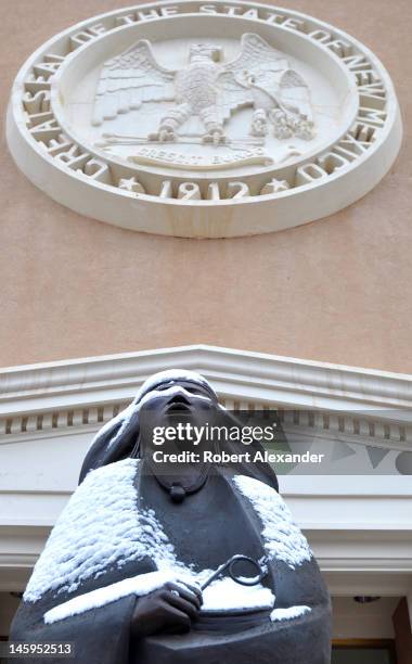 An entrance to the New Mexico State Capitol in Santa Fe, known as the Roundhouse, features a bronze sculpture by Allan Houser. The structure is the...