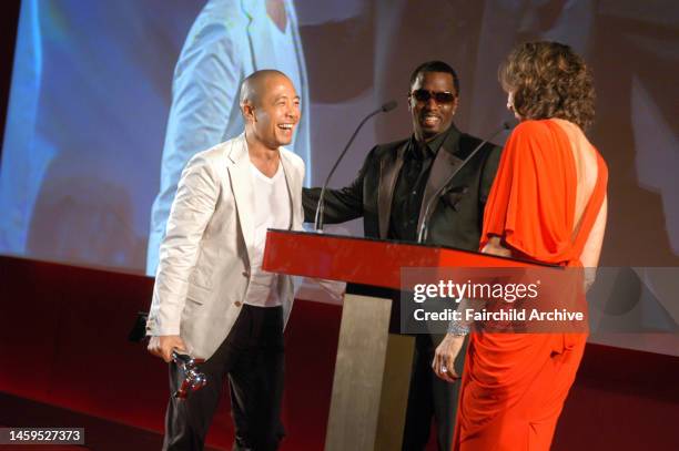 Fashion designers Derek Lam, Sean Combs and Donna Karan attend the Council of Fashion Designers of America's 2005 Fashion Awards at the New York...