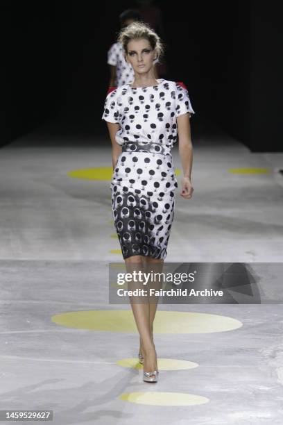 Model on the runway at Giles' spring 2009 show in London. Designer Giles Deacon referenced Pac-Man for his spring 2009 Giles collection.