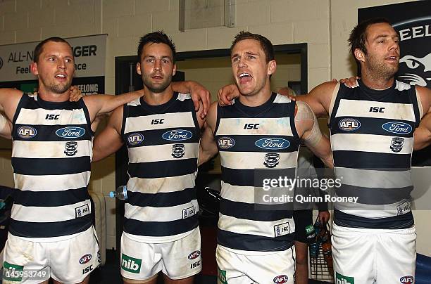 James Kelly,Jimmy Bartel, Joel Selwood and Joel Corey of the Cats sing the song in the rooms after winning the round 11 AFL match between the Carlton...