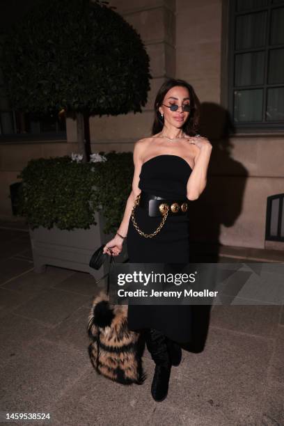 Marina Theodoridou seen wearing dress Khaite, bag Quentin Veron, belt Schiaparelli, jewellery Loree Rodkin, boots Stuart Weitzman during Paris...