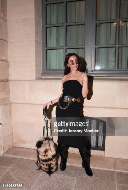 Marina Theodoridou seen wearing dress Khaite, bag Quentin Veron, belt Schiaparelli, jewellery Loree Rodkin, boots Stuart Weitzman during Paris...
