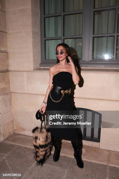 Marina Theodoridou seen wearing dress Khaite, bag Quentin Veron, belt Schiaparelli, jewellery Loree Rodkin, boots Stuart Weitzman during Paris...