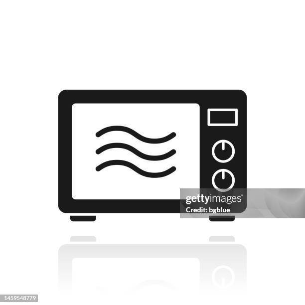 microwave oven. icon with reflection on white background - microwave button clip art stock illustrations