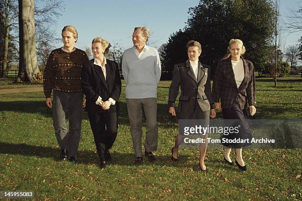 British Conservative Party politician Michael Heseltine walking with his wife Anne and children Rupert, Alexandra and Annabel, at their country home...