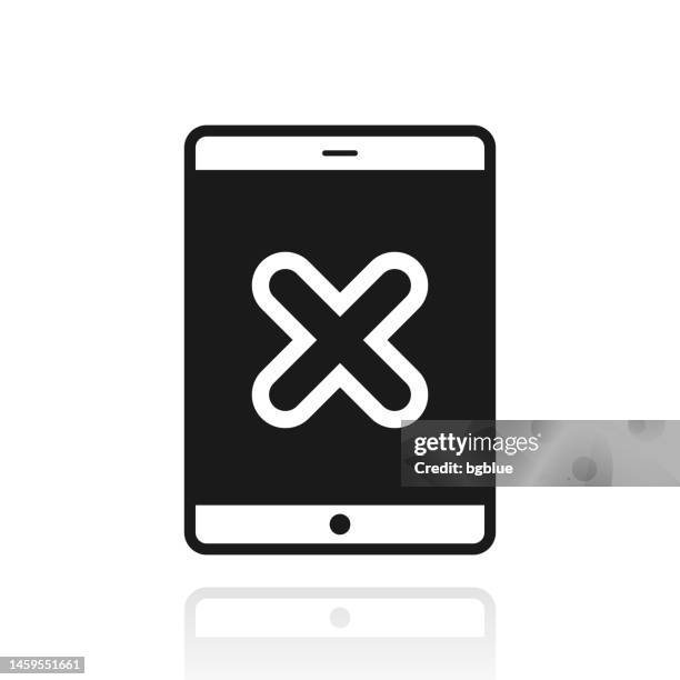 tablet pc with cross mark. icon with reflection on white background - using ipad white background stock illustrations