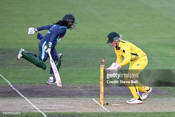 Beth Mooney of Australia looks to runout Javeria Khan of Pakistan during game two of the T20 International series between Australia and Pakistan at...