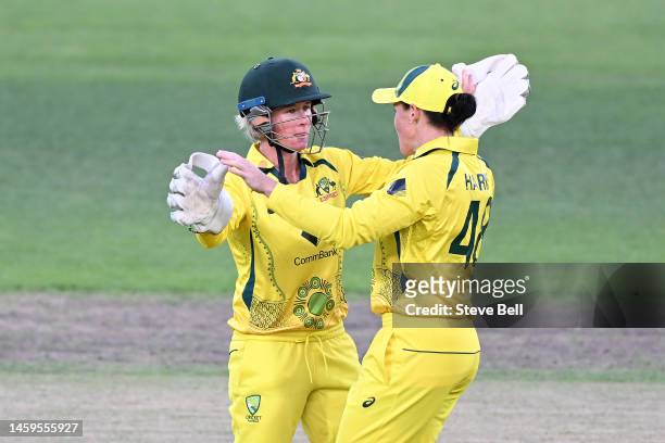 Grace Harris and Beth Mooney of Australia celebrates the wicket of Muneeba Ali Siddiqui of Pakistan during game two of the T20 International series...