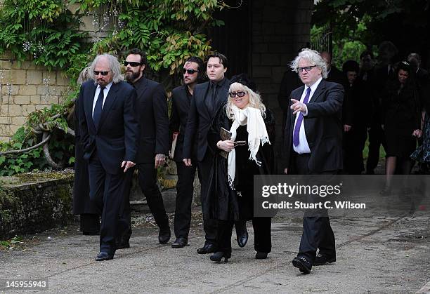 Barry Gibb , Robin's son Robin-John Gibb and Robin's widow Dwina Murphy Gibb and other members of the Gibb family arrive for Robin Gibb's funeral at...