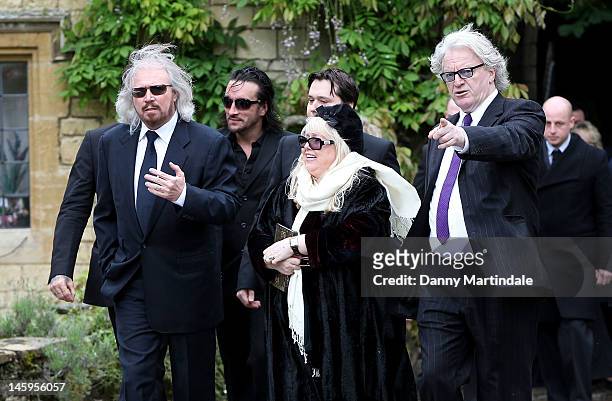Barry Gibb , Robin's son Robin-John Gibb and Robin's widow Dwina Murphy Gibb and other members of the Gibb family arrive for Robin Gibb's funeral at...