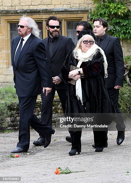 Barry Gibb , Robin's son Robin-John Gibb and Robin's widow Dwina Murphy Gibb and other members of the Gibb family arrive for Robin Gibb's funeral at...