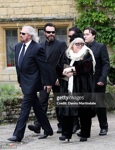 Barry Gibb , Robin's son Robin-John Gibb and Robin's widow Dwina Murphy Gibb and other members of the Gibb family arrive for Robin Gibb's funeral at...