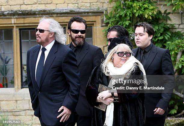 Barry Gibb , Robin's son Robin-John Gibb and Robin's widow Dwina Murphy Gibb and other members of the Gibb family arrive for Robin Gibb's funeral at...