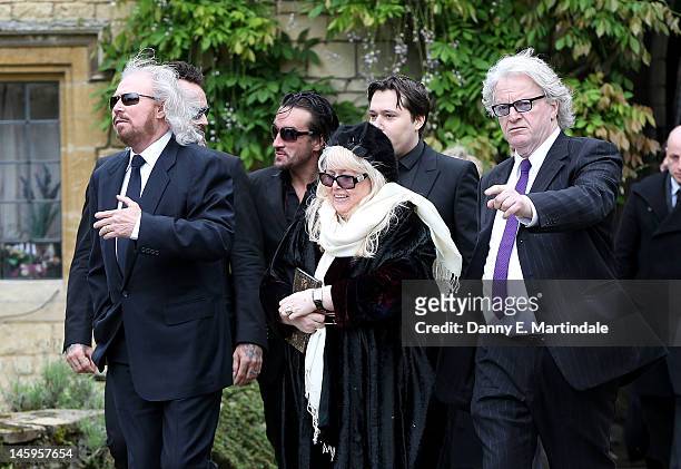 Barry Gibb , Robin's son Robin-John Gibb and Robin's widow Dwina Murphy Gibb and other members of the Gibb family arrive for Robin Gibb's funeral at...