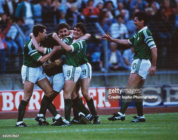 Ronnie Whelan of Republic of Ireland celebrates with team-mates after scoring a superb goal during the UEFA European Championships 1988 Group 2 match...