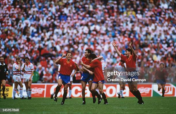 Rafael Gordillo of Spain celebrates scoring the winning goal with team-mates during the UEFA European Championships 1988 Group 1 match between...