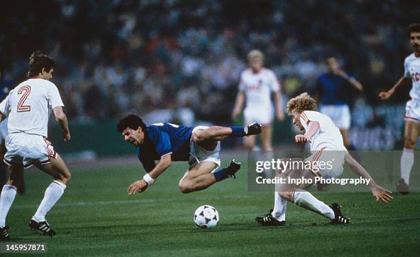 Gianluca Vialli of Italy is sent crashing to the floor by Oleh Kuznetsov of USSR during the UEFA European Championships 1988 Semi-Finals match...