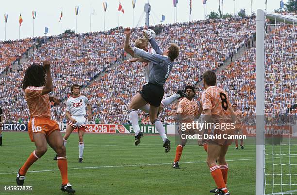 Hans van Breukelen of Netherlands makes a save as Oleksiy Mykhailychenko of USSR makes a challenge during the UEFA European Championships 1988 Final...