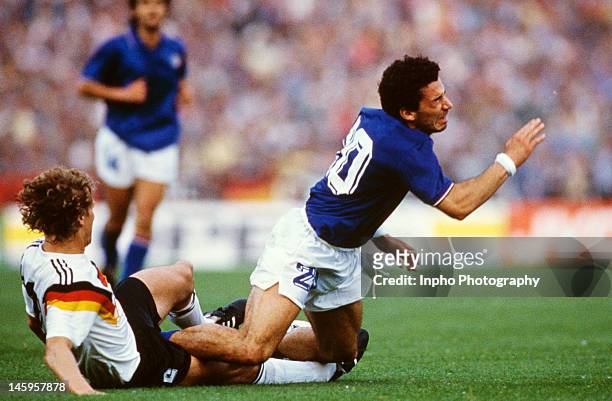 Gianluca Vialli of Italy tackles Guido Buchwald of West Germany during the UEFA European Championships 1988 Group 1 match between West Germany and...