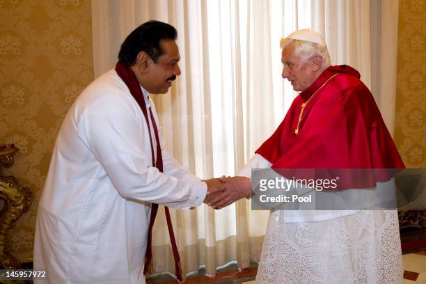 Pope Benedict XVI meets Sri Lankan president Mahinda Rajapaksa at his private library on June 8, 2012 in Vatican City, Vatican.