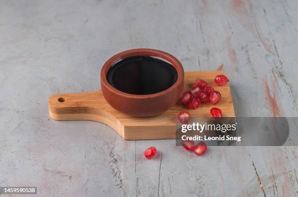 azerbaijani pomegranate sauce narsharab on gray background - ソース ストックフォトと画像