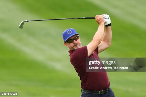 Mikko Korhonen of Finland plays their second shot on the 1st hole during Day One of the Hero Dubai Desert Classic at Emirates Golf Club on January...