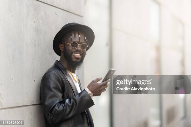 portrait of black man happy smiling - vestimenta stock pictures, royalty-free photos & images