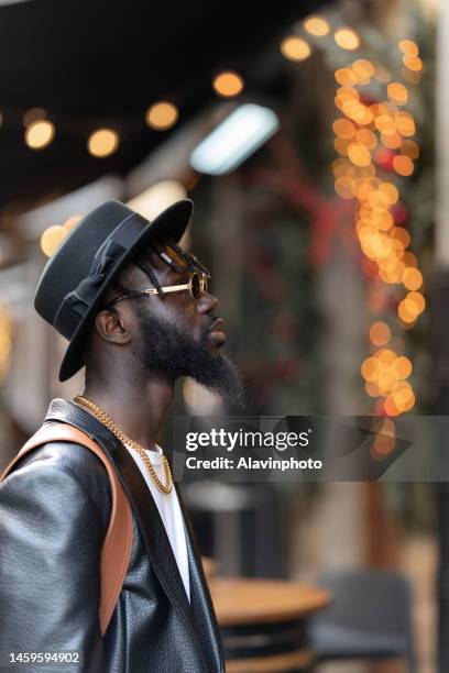 portrait of black man on a city street - vestimenta informal ストックフォトと画像