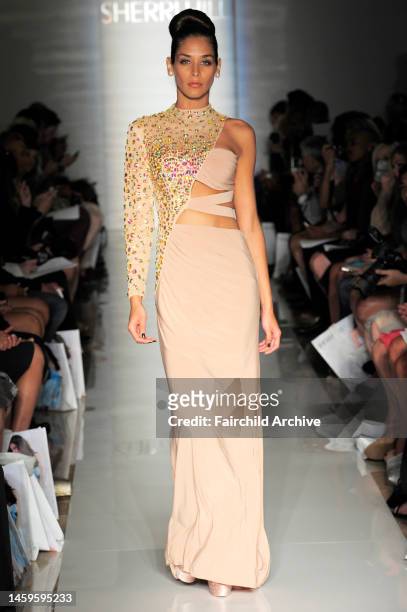 Model on the runway at Evening Sherri Hill's spring 2013 show at Trump Tower.