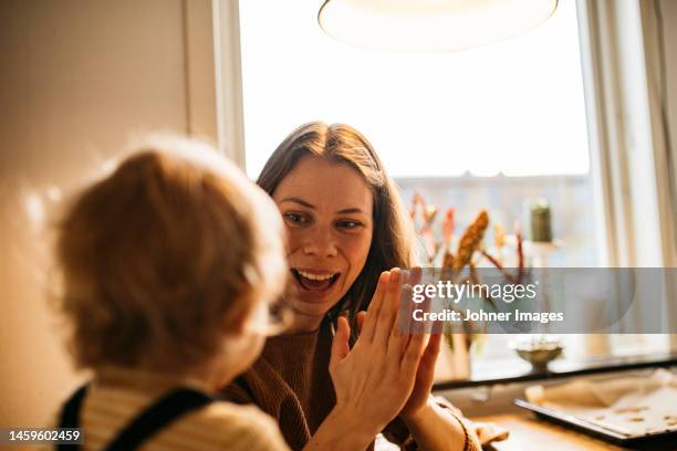 Clapping Mother Mom Clapping With Baby Photos and Premium High Res Pictures - Getty Images