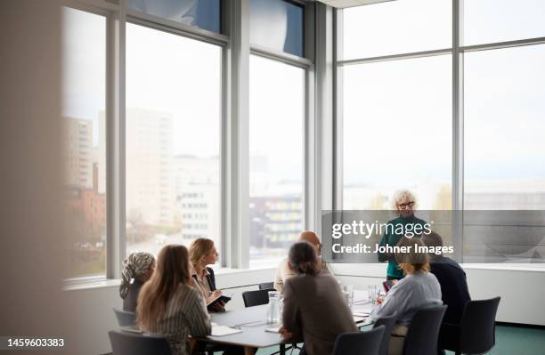 people talking during business meeting - governing board stock pictures, royalty-free photos & images