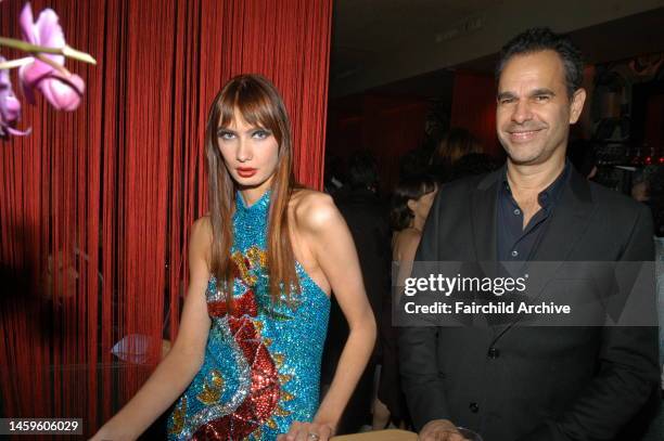 Attends the Indochine 20th Anniversary Party in New York City.