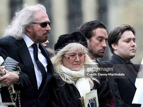 Barry Gibb , Robin's widow Dwina Murphy Gibbson , Robin-John Gibb and other members of the Gibb family attend the funeral of Robin Gibb held at St....