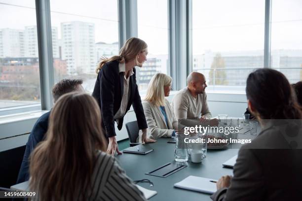 people during business meeting - boardroom meeting stock pictures, royalty-free photos & images