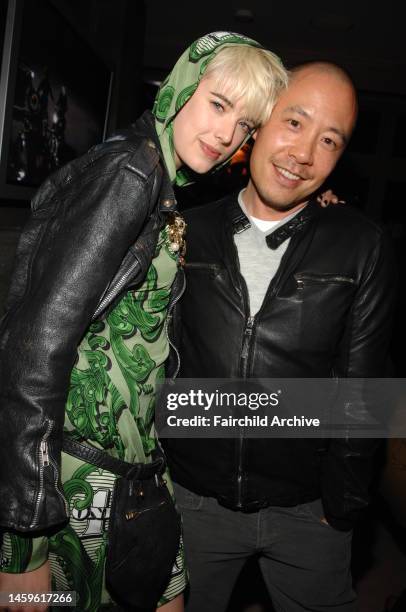 Model Agyness Deyn and fashion designer Derek Lam attend a party for Christie's upcoming sale of Andy Warhol's 'Double Marlon' painting at the Soho...