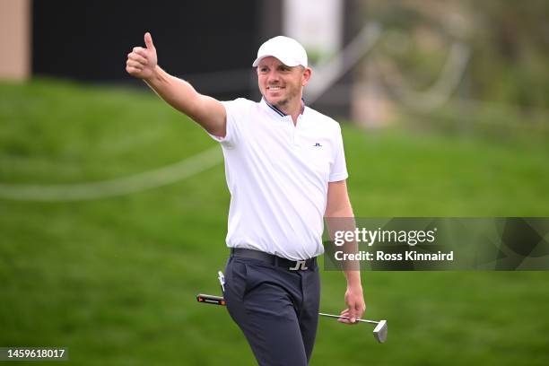 Matt Wallace of England gives a thumbs up on the 15th hole during Day One of the Hero Dubai Desert Classic at Emirates Golf Club on January 26, 2023...