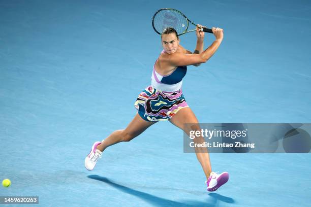 Aryna Sabalenka plays a backhand in the Semifinal singles match against Magda Linette of Poland during day 11 of the 2023 Australian Open at...