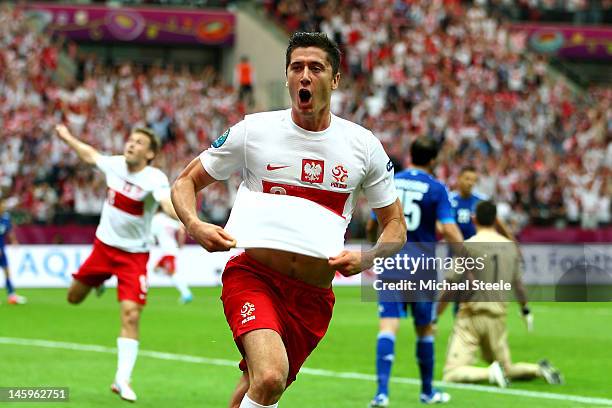 Robert Lewandowski of Poland celebrates scoring the opening goal during the UEFA EURO 2012 Group A match between Poland and Greece at National...
