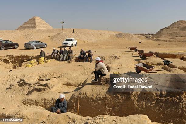 Egyptian archaeological workers excavating the site of the Step Pyramid of Djoser in Saqqara during the announcement of new discoveries at the...