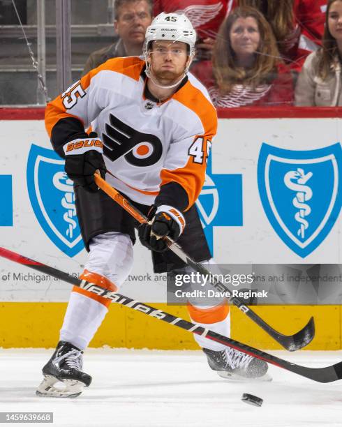 Cam York of the Philadelphia Flyers passes the puck against the Detroit Red Wings during the first period of an NHL game at Little Caesars Arena on...