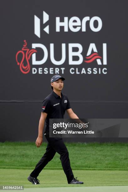 Min Woo Lee of Australia walks on the 18th green during Day One of the Hero Dubai Desert Classic at Emirates Golf Club on January 26, 2023 in Dubai,...