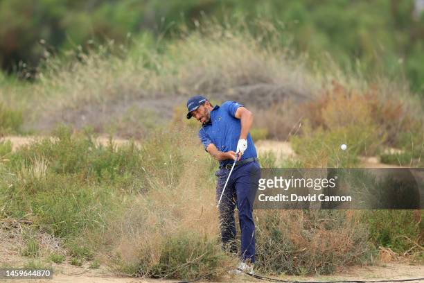 Pablo Larrazabal of Spian plays his second shot on the 13th hole during Day One of the Hero Dubai Desert Classic on the Majlis Course at The Emirates...