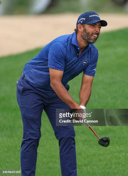Pablo Larrazabal of Spain follows his third shot on the 13th hole during Day One of the Hero Dubai Desert Classic on the Majlis Course at The...