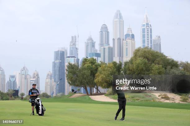 Eddie Pepperell of England plays a shot during Day One of the Hero Dubai Desert Classic at Emirates Golf Club on January 26, 2023 in Dubai, United...